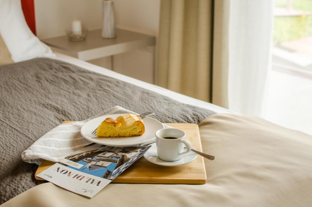 Orizzonti D'Anaunia Aparthotel Tassullo Bagian luar foto